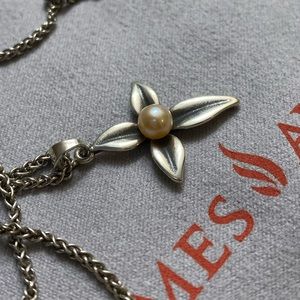 Leaf cross with pearl necklace.